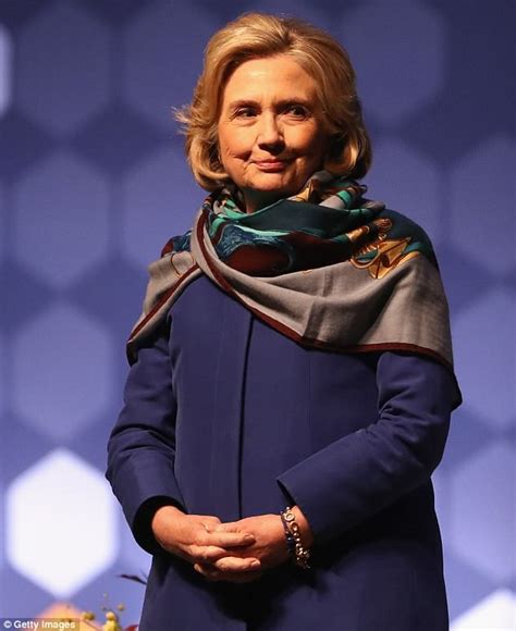 hillary clinton hermes scarf back brace|Hillary Clinton covers neck and shoulders with large scarf after .